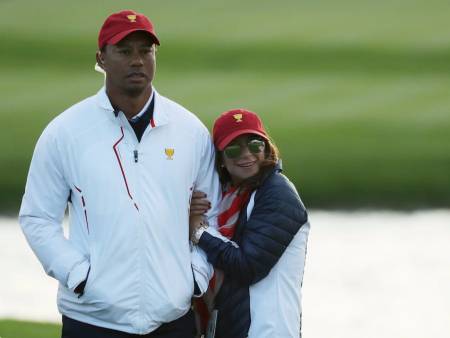 Tiger Woods with his girlfriend, Erica Herman